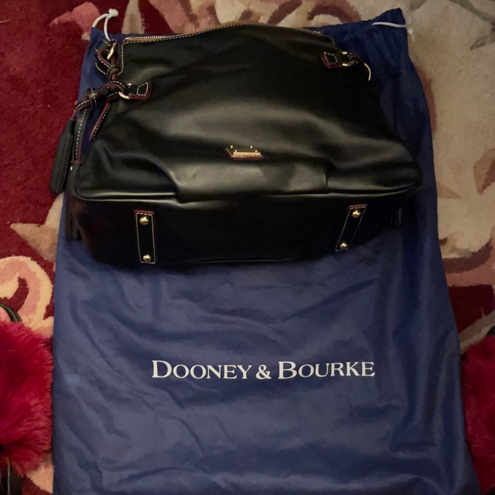 Black leather Dooney &Burke includes Dust bag
